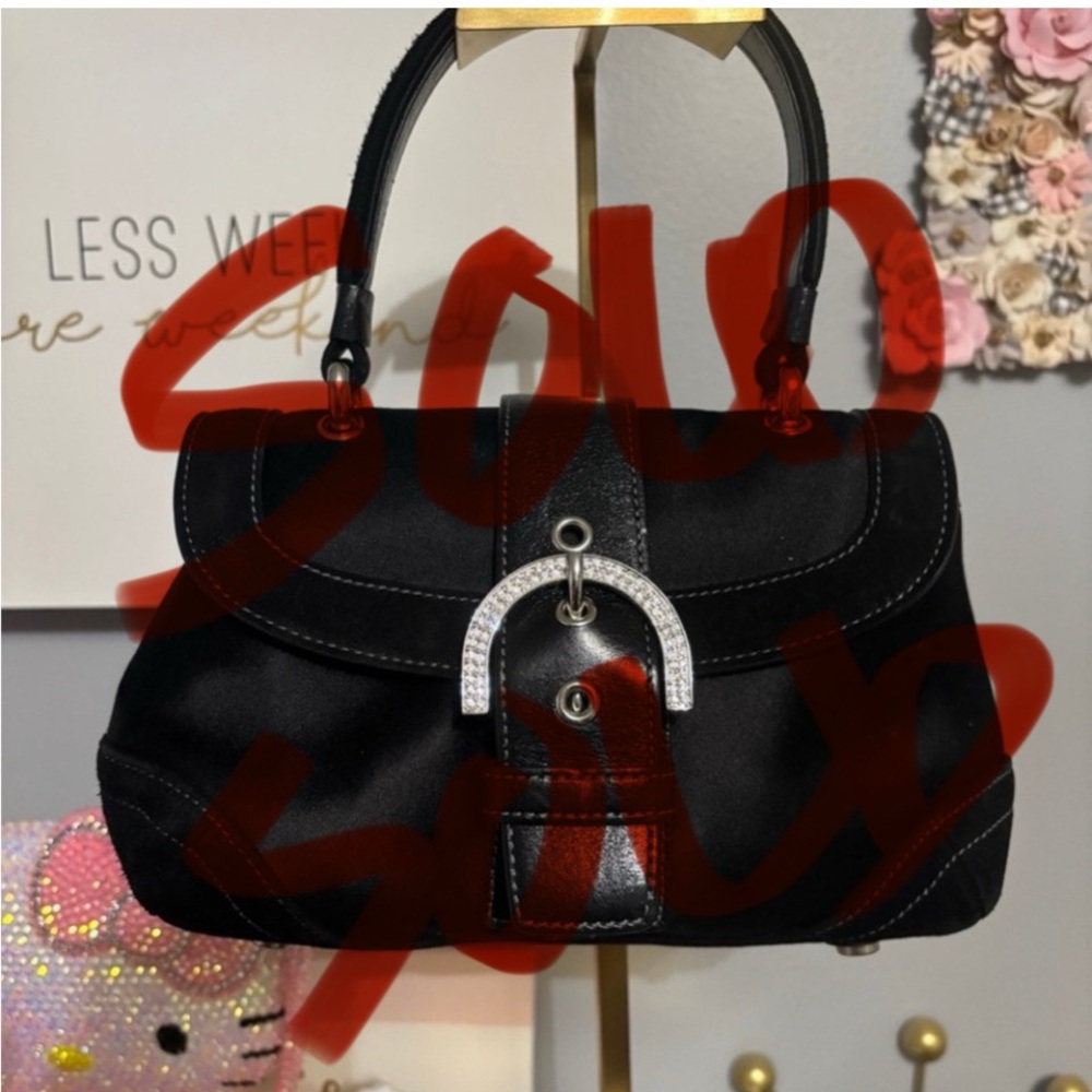 Sold 
Coach Black Shoulder Bag with Silver Accents